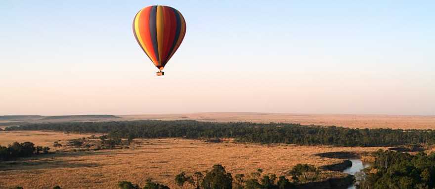 Hot air balloon over Masai Mara in Kenya Hot air balloon over Masai Mara in Kenya