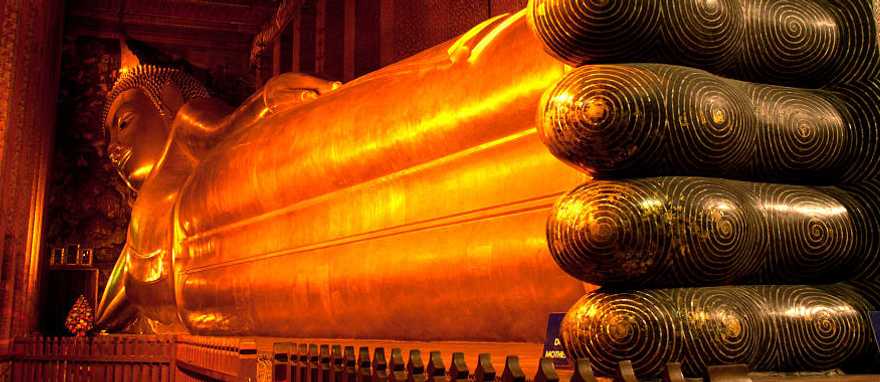 Golden reclining Buddha in Bangkok, Thailand. Golden reclining Buddha in Bangkok, Thailand.