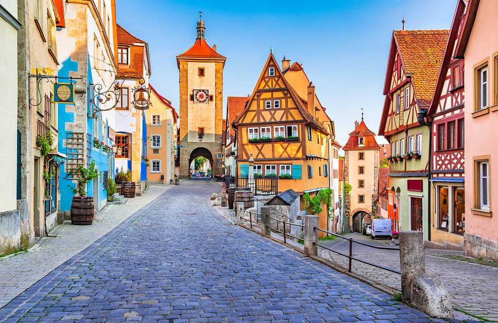 Rothenburg ob der Tauber, Germany Cobblestone streets and colorful half-timbered buildings aroung Ploenlein Square in Rothenburg ob der Tauber, Gerrmany
