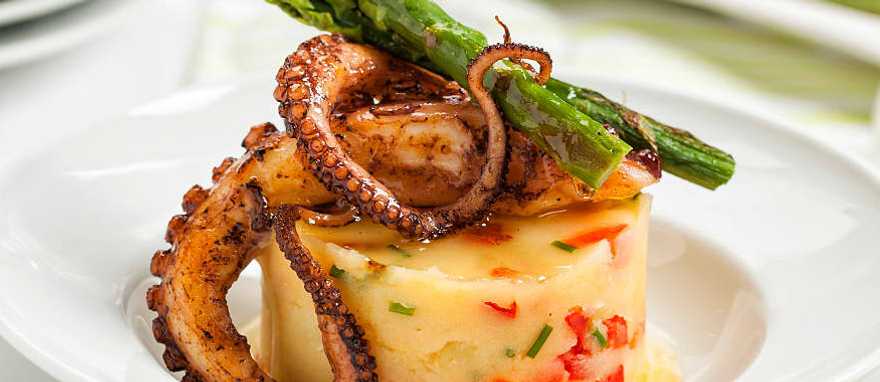 Grilled octopus served at a restaurant in San Sebastian, Spain. Grilled octopus served at a restaurant in San Sebastian, Spain.