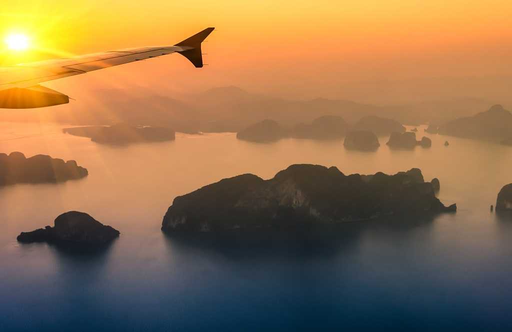 Flying over Phang Nga Bay at sunset Flying over Phang Nga Bay at sunset