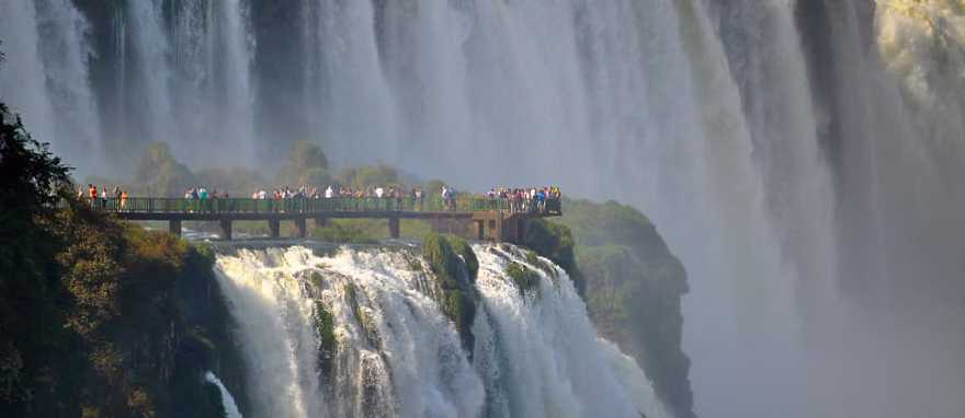 The impressive power of the rushing waters of the Iguazu Falls - Argentina is the perfect place for a couple to relax. The impressive power of the rushing waters of the Iguazu Falls - Argentina is the perfect place for a couple to relax.