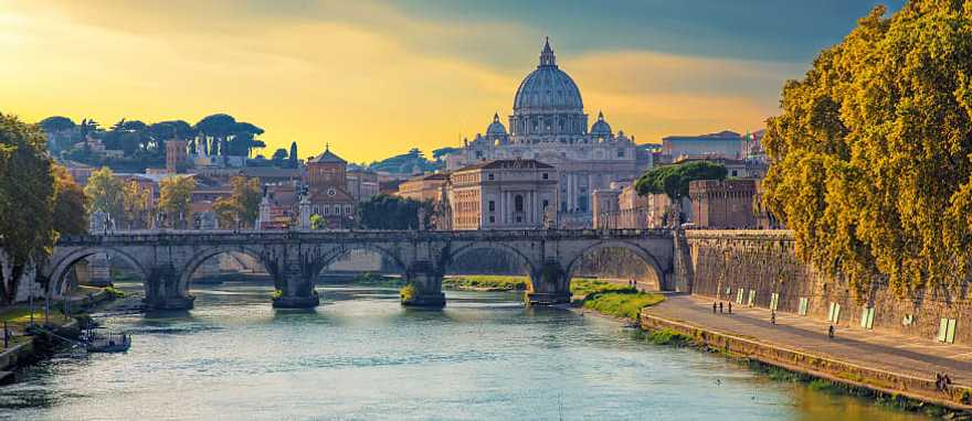 View of the Tiber and St. Peter's Basilica at sunset, Rome, Italy View of the Tiber and St. Peter's Basilica at sunset, Rome, Italy
