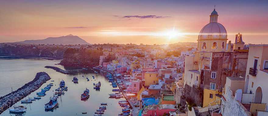 Prodica, Italy Romantic sunset over Procida, one of the Flegrean Islands off the coast of Naples in southern Italy