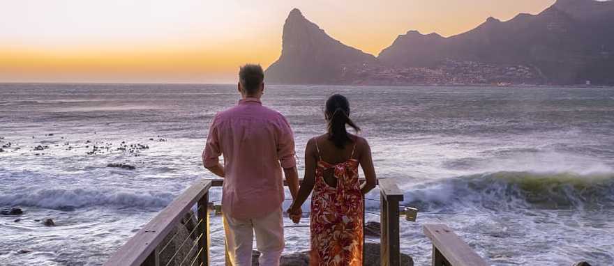 Couple in Cape Town at sunset in South Africa Couple in Cape Town at sunset in South Africa
