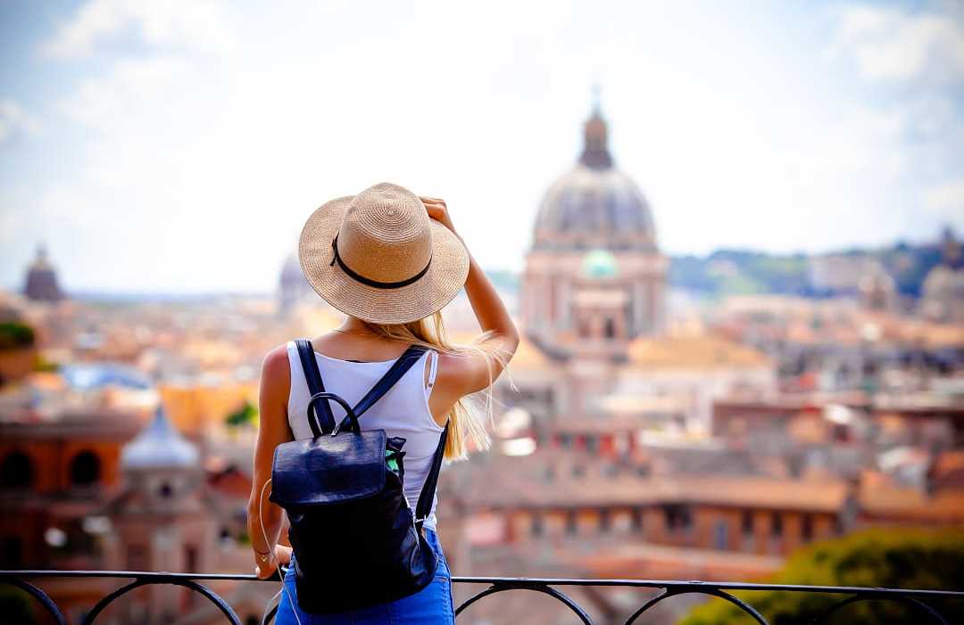 Vatican, Rome, Italy Woman enjoying the view of the Vatican in Rome, Italy