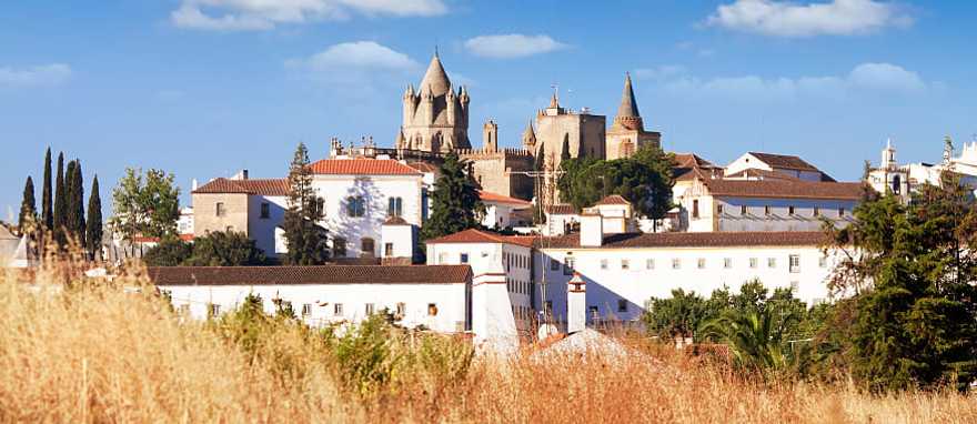 Washed buildings surrounding the Cathedral in Evora, Portugal Washed buildings surrounding the Cathedral in Evora, Portugal