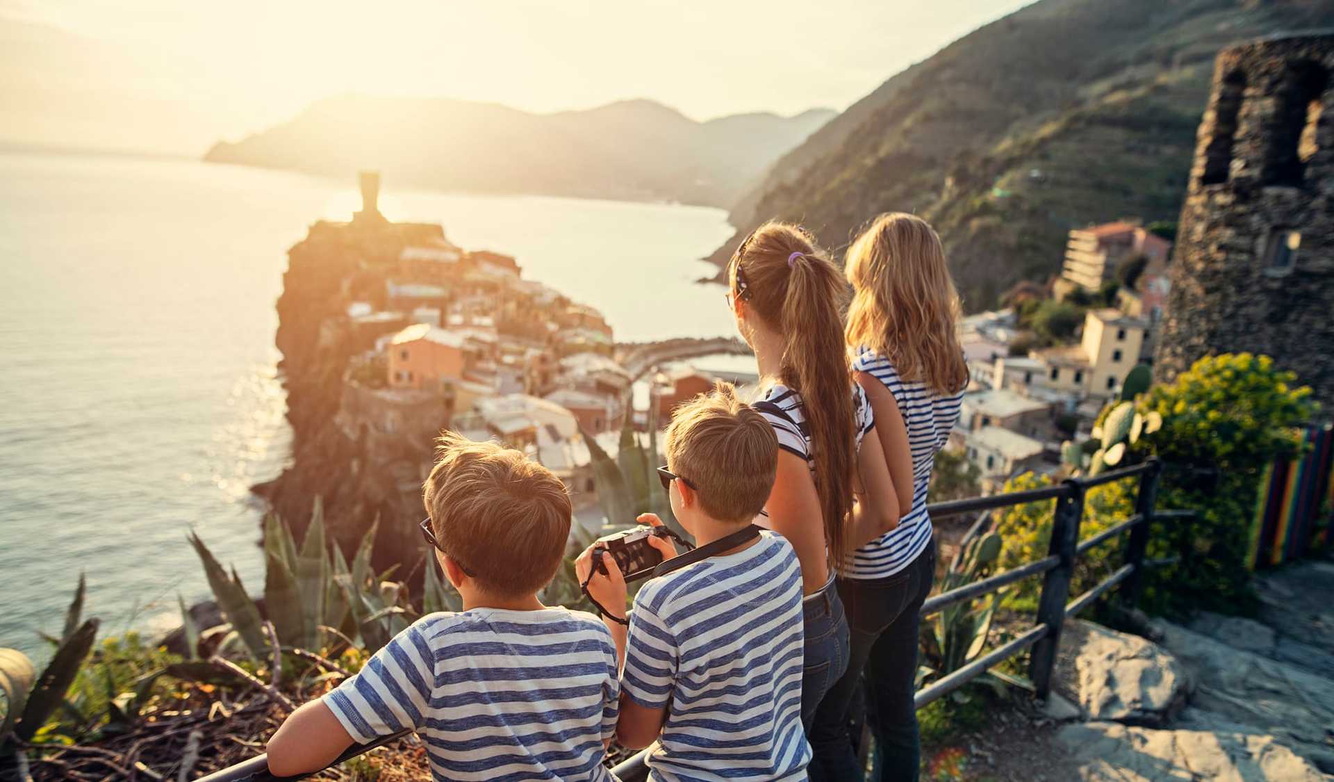 Family viewing Cinque Terre Vernazza in Italy