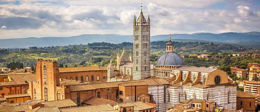 View of the city and cathedral of Siena, Italy View of the city and cathedral of Siena, Italy