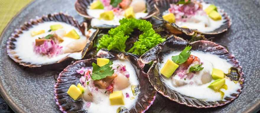 Fresh scallops served at a restaurant in Peru Fresh scallops served at a restaurant in Peru