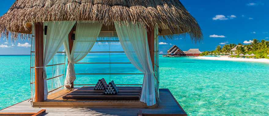 Romantic spa bungalow over the water in Tahiti. Romantic spa bungalow over the water in Tahiti.